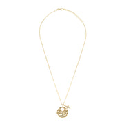 Star glow crystal disc necklace in gold with a crystal star charm in gold plated on sterling silver