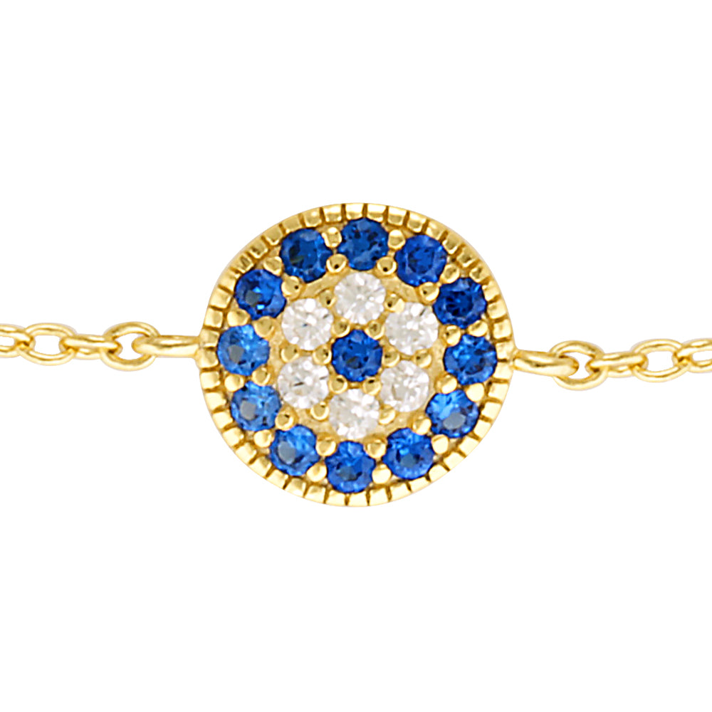 gold evil eye and cross bracelet details