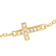 gold evil eye and cross bracelet details