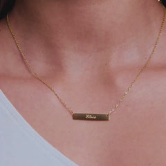 Gols Engraved Necklace on model with the name Elvie engraved