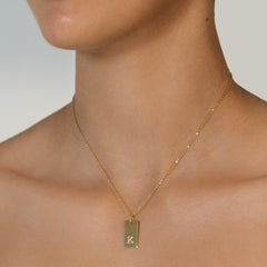XL Tag Necklace engraved with the Initial K in Classic font