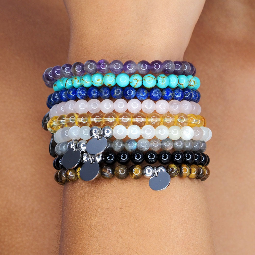 Hand made bracelets made with natural stones and semi precious gem stones, materials include turquoise, lapis lazuli, onyx, tigers eye, labradorite, amethyst, citrine, rose quartz and moonstone, bracelets are personalised with engraving of initials or name or date